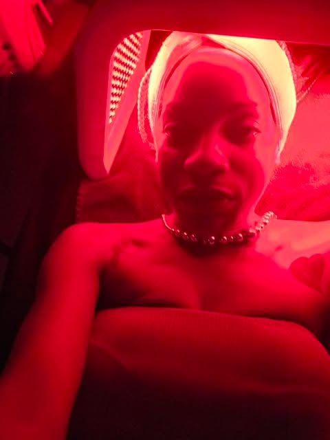 Eve enjoying a red-light therapy session